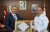  Maliye Bakanı Alişan Şan, Güneşköy Muhtarı Akay Darbaz’ı kabul etti